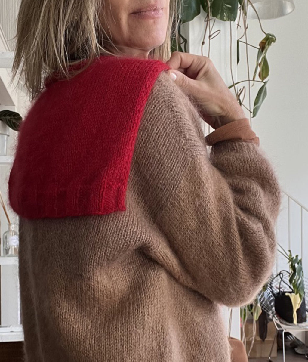 Le pull sur les épaules "ROMY"