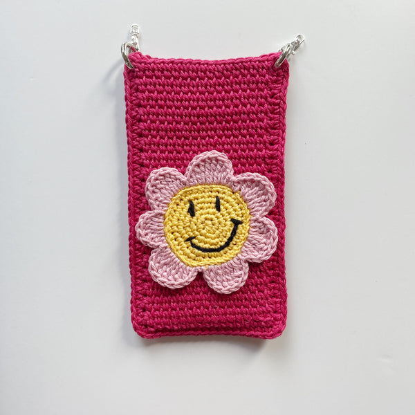 La pochette de téléphone "SMILEY FLOWER"